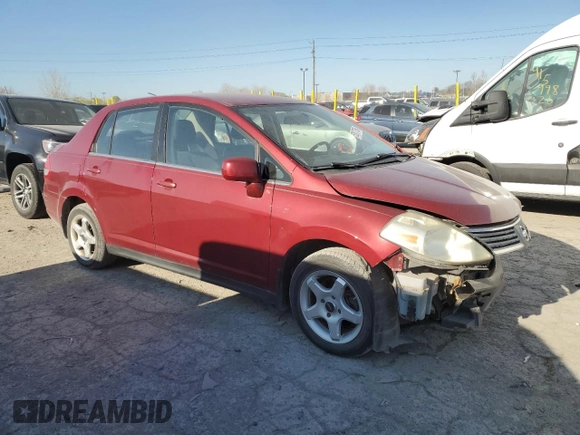2009 Nissan Versa S with VIN 3N1BC11E29L372572, listed as a Copart auction lot 52817755 with 165,493 mi miles and Salvage Title. Bid and sale history available at DreamBid. Image 4.