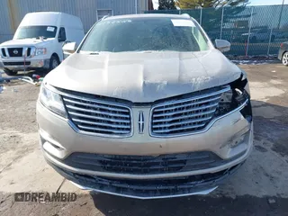 2015 Lincoln MKC z VIN 5LMCJ2A96FUJ47386, wystawiony jako IAAI lot #41525018 z przebiegiem 97 670 mil mil oraz . Historia ofert i sprzedaży dostępna na DreamBid. Obrazek 12.