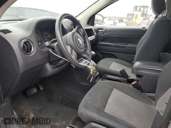 2015 Jeep Compass Sport with VIN 1C4NJCBA9FD104823, listed as a Copart auction lot 43799545 with 101,650 mi miles and Salvage Title. Bid and sale history available at carsss.com. Image 7.