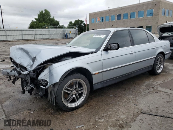 1997 BMW 7 Series 740il with VIN WBAGJ8323VDM00753, listed as a Copart auction lot 66674414 with 255,389 mi miles and Salvage Title. Bid and sale history available at carsss.com. Image 1.