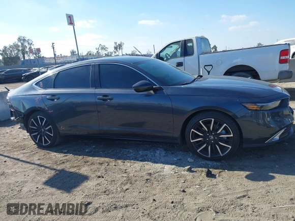 2023 Honda Accord Touring with VIN 1HGCY2F88PA030867, listed as a IAAI auction lot 41344807 with 19,745 mi miles and . Bid and sale history available at DreamBid. Image 14.