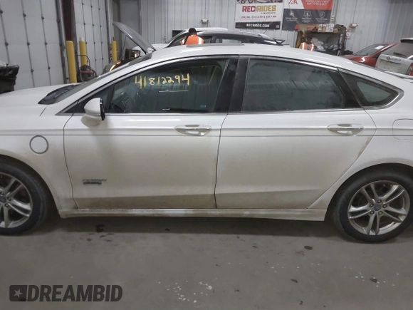 2016 Ford Fusion Titanium with VIN 3FA6P0SU8GR259163, listed as a IAAI auction lot 41812294 with 151,002 mi miles and . Bid and sale history available at DreamBid. Image 14.