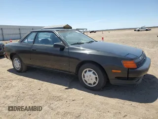 1989 Toyota Celica z VIN JT2ST67C8K7337876, wystawiony jako Copart lot #57918785 z przebiegiem 16 862 mil mil oraz Tytuł czysty. Historia ofert i sprzedaży dostępna na DreamBid. Obrazek 4.