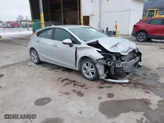 2017 Chevrolet Cruze LT with VIN 3G1BE6SM9HS609257, listed as a IAAI auction lot 41314653 with 140,627 mi miles. Bid and sale history available at carsss.com. Image 1.