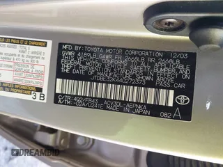 2004 Toyota Camry LE with VIN JTDBE32K440272373, listed as a IAAI auction lot 41949768 with 205,093 mi miles. Bid and sale history available at carsss.com. Image 9.