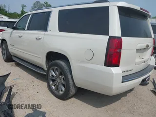 2015 Chevrolet Suburban LTZ with VIN 1GNSCKKC5FR740352, listed as a IAAI auction lot 39075234 with 112,945 mi miles and . Bid and sale history available at DreamBid. Image 3.