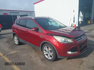 2015 Ford Escape Titanium with VIN 1FMCU0JX8FUC64769, listed as a IAAI auction lot 42404732 with 165,079 mi miles and . Bid and sale history available at DreamBid. Image 1.