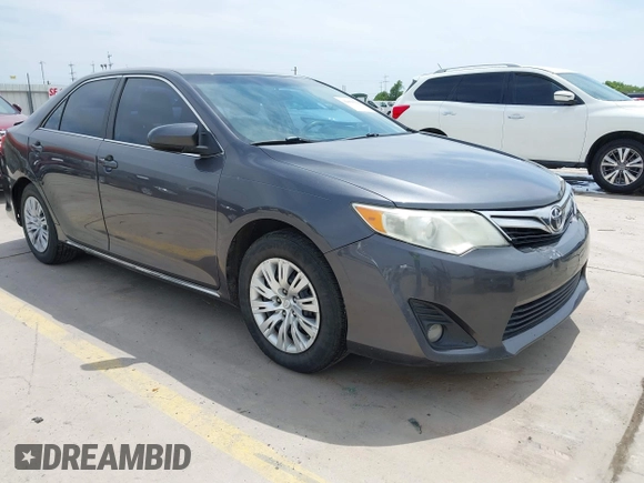 2014 Toyota Camry L with VIN 4T4BF1FKXER379158, listed as a IAAI auction lot 42050926 with 88,060 mi miles and . Bid and sale history available at DreamBid. Image 1.