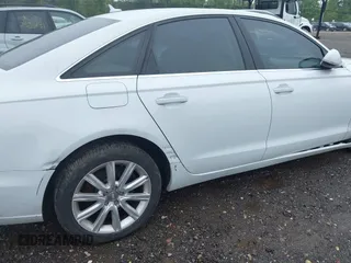 2014 Audi A6 Premium Plus z VIN WAUFGAFC4EN081900, wystawiony jako IAAI lot #42268150 z przebiegiem 150 238 mil mil oraz . Historia ofert i sprzedaży dostępna na DreamBid. Obrazek 19.