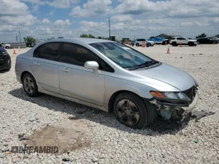 2009 Honda Civic LX z VIN 2HGFA16569H303861, wystawiony jako Copart lot #53148385 z przebiegiem 164 179 mil mil oraz Szkoda całkowita • Salvage title. Historia ofert i sprzedaży dostępna na DreamBid. Obrazek 4.