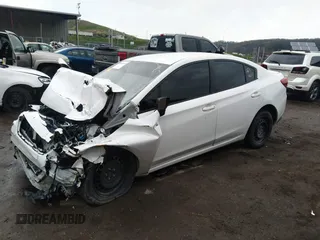 2019 Subaru Impreza with VIN 4S3GKAA67K1604384, listed as a IAAI auction lot 39202404 with 47,000 mi miles and . Bid and sale history available at DreamBid. Image 2.