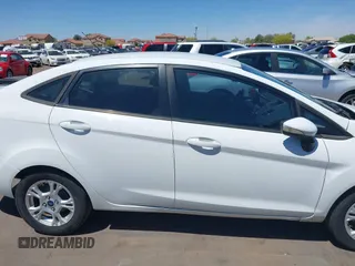2014 Ford Fiesta SE with VIN 3FADP4BJ0EM172033, listed as a IAAI auction lot 42153874 with 155,640 mi miles. Bid and sale history available at carsss.com. Image 13.