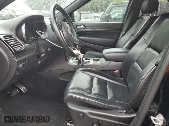 2021 Jeep Grand Cherokee High Altitude with VIN 1C4RJFCG3MC527325, listed as a Copart auction lot 55832875 with 64,338 mi miles and Salvage title. Bid and sale history available at DreamBid. Image 7.
