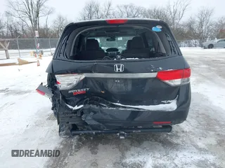 2015 Honda Odyssey EX-L with VIN 5FNRL5H60FB018030, listed as a IAAI auction lot 41608357 with 166,214 mi miles and . Bid and sale history available at carsss.com. Image 6.