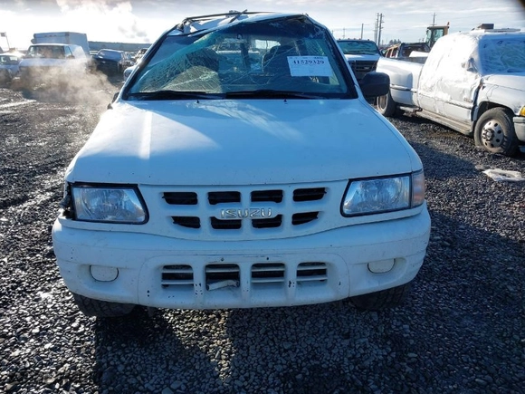 2001 Isuzu Rodeo S with VIN 4S2DM58W014335513, listed as a IAAI auction lot 41529329 with NaN miles. Bid and sale history available at carsss.com. Image 13.