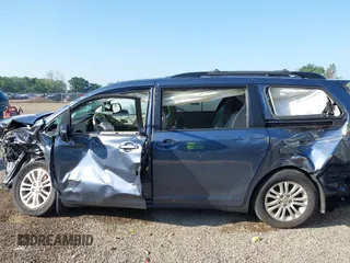 2014 Toyota Sienna XLE with VIN 5TDYK3DCXES524294, listed as a IAAI auction lot 42546467 with 122,257 mi miles and . Bid and sale history available at DreamBid. Image 14.