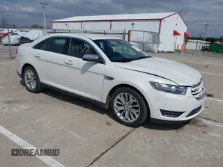 2014 Ford Taurus Limited z VIN 1FAHP2F84EG179915, wystawiony jako IAAI lot #41983745 z przebiegiem 128 562 mil mil oraz . Historia ofert i sprzedaży dostępna na DreamBid. Obrazek 1.