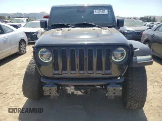 2020 Jeep Wrangler Unlimited Rubicon с VIN 1C4HJXFN3LW350249, выставлен на аукционе Copart как лот 60696895 с пробегом 56 577 миль миль и Списание • Salvage title. История ставок и продаж доступна на DreamBid. Изображение 5.