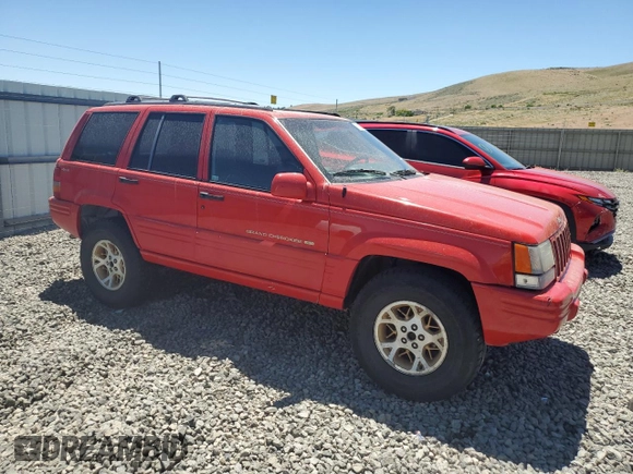 1997 Jeep Grand Cherokee Limited with VIN 1J4GZ78Y7VC573971, listed as a Copart auction lot 61358024 with 171,055 mi miles and Salvage Title. Bid and sale history available at carsss.com. Image 4.