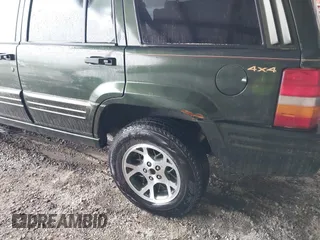 1997 Jeep Grand Cherokee Limited with VIN 1J4GZ78Y5VC723429, listed as a IAAI auction lot 42012836 with 231,126 mi miles. Bid and sale history available at carsss.com. Image 6.