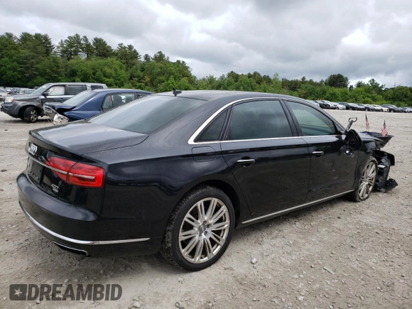 2015 Audi A8 4.0T with VIN WAU32AFD6FN013982, listed as a Copart auction lot 58122294 with 100,981 mi miles and Clean title. Bid and sale history available at DreamBid. Image 3.