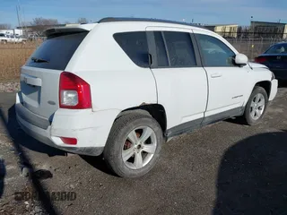 2014 Jeep Compass Latitude with VIN 1C4NJCEB0ED660019, listed as a IAAI auction lot 41200065 with 185,174 mi miles. Bid and sale history available at carsss.com. Image 4.