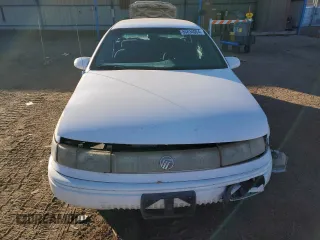 1995 Mercury Sable GS z VIN 1MELM50UXSG617772, wystawiony jako Copart lot #86834064 z przebiegiem 120 994 mil mil oraz Szkody całkowita. Historia ofert i sprzedaży dostępna na DreamBid. Obrazek 5.