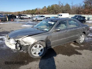 2001 Mazda 626 LX with VIN 1YVGF22D815242283, listed as a Copart auction lot 42141985 with 36,448 mi miles and Salvage Title. Bid and sale history available at carsss.com. Image 1.