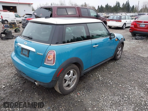 2009 MINI Cooper Hardtop with VIN WMWMF33569TW70413, listed as a IAAI auction lot 41776589 with 85,394 mi miles. Bid and sale history available at carsss.com. Image 4.