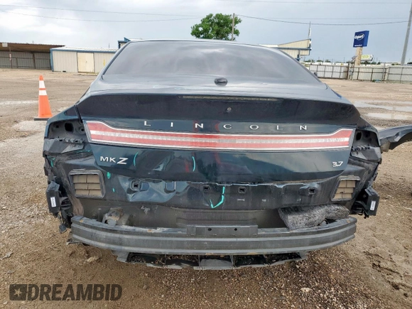 2014 Lincoln MKZ with VIN 3LN6L2GK0ER811644, listed as a Copart auction lot 60094105 with 115,623 mi miles and Salvage title. Bid and sale history available at DreamBid. Image 6.