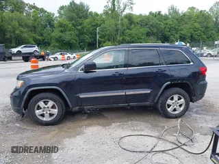 2011 Jeep Grand Cherokee Laredo with VIN 1J4RR4GG8BC543468, listed as a IAAI auction lot 42431481 with 224,639 mi miles and . Bid and sale history available at DreamBid. Image 14.