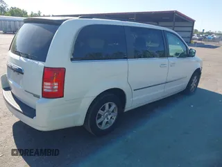 2010 Chrysler Town & Country Touring with VIN 2A4RR5D11AR493086, listed as a IAAI auction lot 42012604 with 154,204 mi miles and . Bid and sale history available at DreamBid. Image 4.