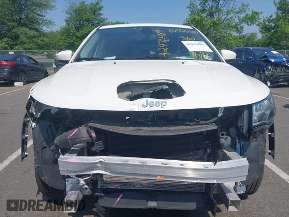 2020 Jeep Compass Latitude z VIN 3C4NJDBBXLT168695, wystawiony jako IAAI lot #42476489 z przebiegiem 23 213 mil mil oraz . Historia ofert i sprzedaży dostępna na DreamBid. Obrazek 6.