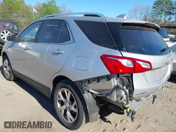 2018 Chevrolet Equinox Premier with VIN 3GNAXVEV4JS598239, listed as a IAAI auction lot 42112886 with 142,093 mi miles and . Bid and sale history available at DreamBid. Image 3.