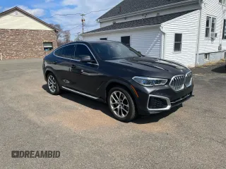 2021 BMW X6 xDrive40i z VIN 5UXCY6C02M9D88338, wystawiony jako Copart lot #50947775 z przebiegiem 116 477 mil mil oraz Czysty tytuł • Clean title. Historia ofert i sprzedaży dostępna na DreamBid. Obrazek 4.