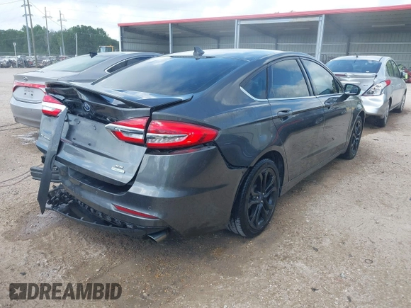 2019 Ford Fusion SE with VIN 3FA6P0HD7KR169700, listed as a IAAI auction lot 42064494 with 56,463 mi miles and . Bid and sale history available at DreamBid. Image 4.