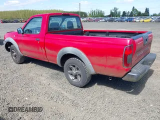 2001 Nissan Frontier XE z VIN 1N6DD21S41C390650, wystawiony jako IAAI lot #42055644 z przebiegiem 134 610 mil mil oraz . Historia ofert i sprzedaży dostępna na DreamBid. Obrazek 3.