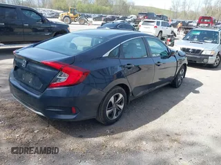2021 Honda Civic LX z VIN 19XFC2F65ME000324, wystawiony jako IAAI lot #42137375 z przebiegiem 78 473 mil mil oraz . Historia ofert i sprzedaży dostępna na DreamBid. Obrazek 4.