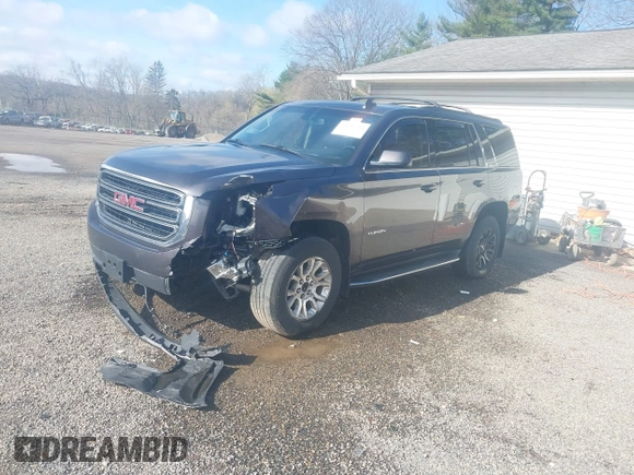 2016 GMC Yukon SLE with VIN 1GKS2AKC9GR273724, listed as a IAAI auction lot 41945761 with 141,425 mi miles. Bid and sale history available at carsss.com. Image 2.