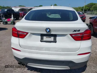 2015 BMW X4 xDrive28i with VIN 5UXXW3C59F0M88331, listed as a IAAI auction lot 42093953 with 138,205 mi miles and . Bid and sale history available at DreamBid. Image 16.