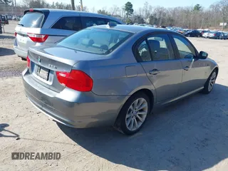 2011 BMW 3 Series 328i xDrive with VIN WBAPK7C57BA819476, listed as a IAAI auction lot 41998058 with 150,412 mi miles. Bid and sale history available at carsss.com. Image 4.