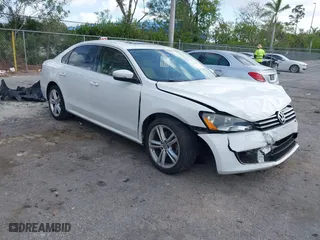 2014 Volkswagen Passat SE w/Sunroof with VIN 1VWBS7A37EC079738, listed as a IAAI auction lot 41707449 with 61,939 mi miles. Bid and sale history available at carsss.com. Image 1.