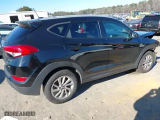2016 Hyundai Tucson SE with VIN KM8J3CA4XGU039773, listed as a IAAI auction lot 41295718 with 161,209 mi miles. Bid and sale history available at carsss.com. Image 4.