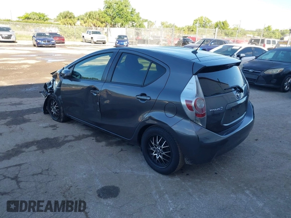 2013 Toyota Prius One with VIN JTDKDTB39D1536905, listed as a IAAI auction lot 41962613 with 212,078 mi miles and . Bid and sale history available at DreamBid. Image 3.