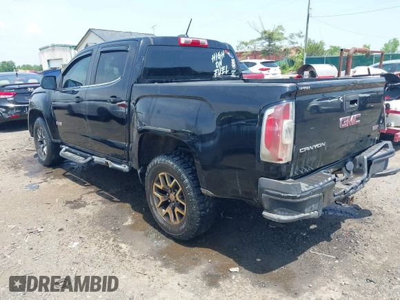 2016 GMC Canyon 4WD SLE z VIN 1GTG6CE35G1171168, wystawiony jako IAAI lot #42275447 z przebiegiem 171 581 mil mil oraz . Historia ofert i sprzedaży dostępna na DreamBid. Obrazek 3.