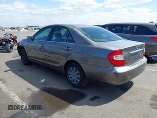 2004 Toyota Camry LE with VIN 4T1BE32K44U825561, listed as a IAAI auction lot 42051914 with 244,521 mi miles and . Bid and sale history available at DreamBid. Image 2.