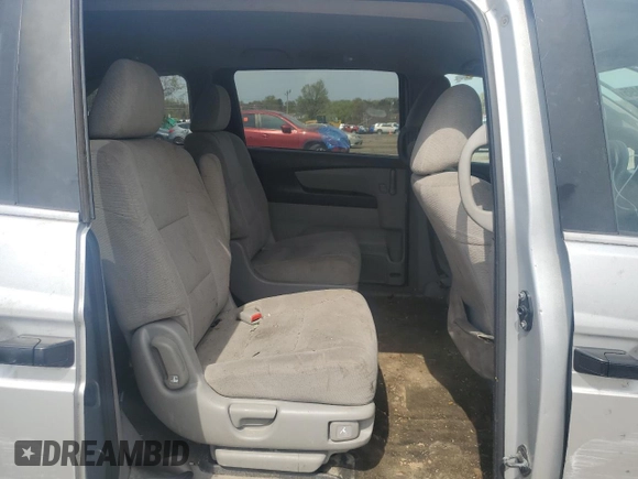 2013 Honda Odyssey LX z VIN 5FNRL5H28DB085114, wystawiony jako Copart lot #52942495 z przebiegiem 158 191 mil mil oraz Szkoda całkowita • Salvage title. Historia ofert i sprzedaży dostępna na DreamBid. Obrazek 11.