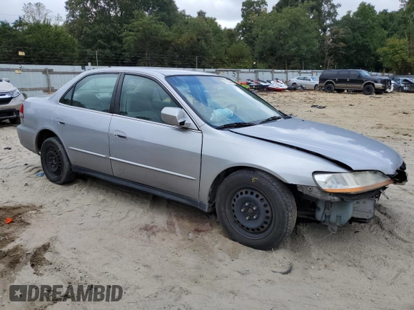 2001 Honda Accord LX with VIN 1HGCG16401A073312, listed as a Copart auction lot 71996444 with 232,315 mi miles and Salvage title. Bid and sale history available at DreamBid. Image 4.