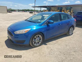 2018 Ford Focus SE with VIN 1FADP3F26JL206923, listed as a Copart auction lot 63042955 with 96,242 mi miles and Clean title. Bid and sale history available at DreamBid. Image 1.