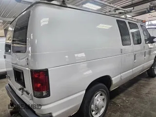 2013 Ford Econoline Cargo Commercial with VIN 1FTNE1EW6DDB01438, listed as a IAAI auction lot 42737683 with 125,160 mi miles and . Bid and sale history available at DreamBid. Image 6.